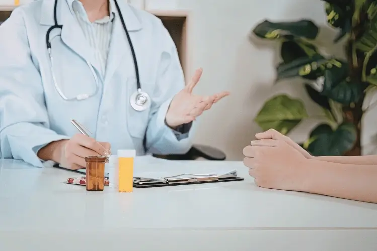 Doctor consulting male patient during confidential STD testing appointment at Dr Plus Clinic JB